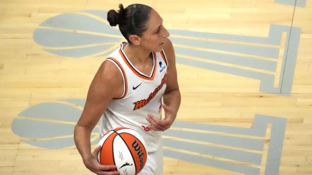 Mercury guard Diana Taurasi (3) in bounds the ball during a game against the Fever.